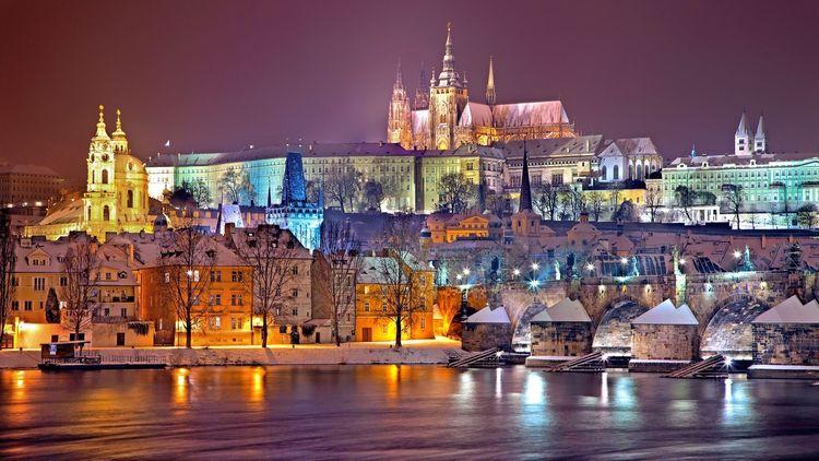 City of Prague lit up with multicoloured lights