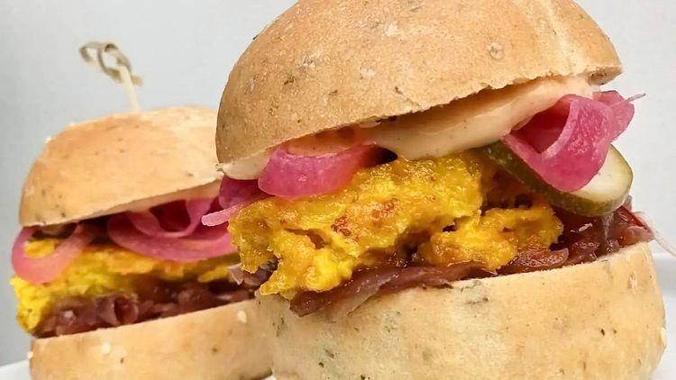 Lynchpin Holywood’s two colourful vegan burgers next to each other