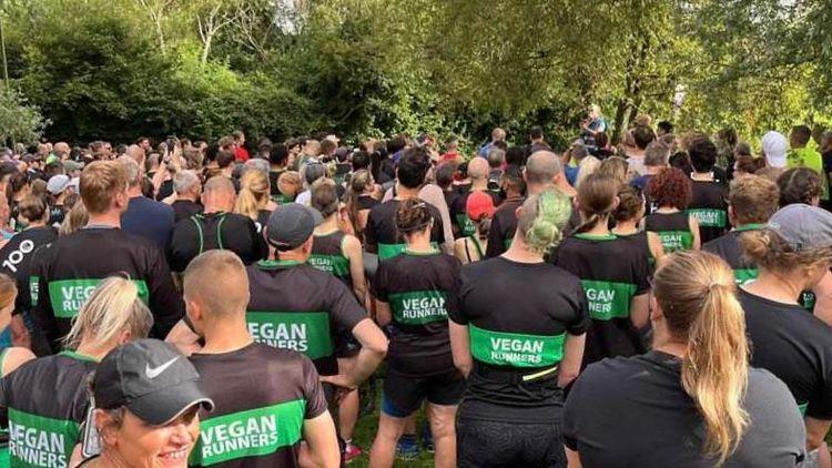 Large group of Vegan Runners gathered in Bicester park during Vegan Camp Out