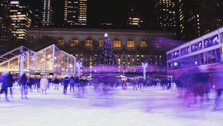 People skating at Bryant Park Ice Rink in New York City at Christmas